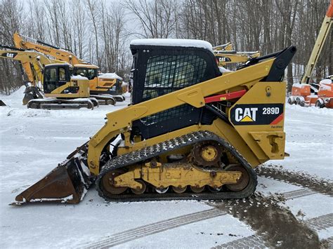 driveway sitework cat skid steer|Cat 289D skid steer spreading crushed concrete .